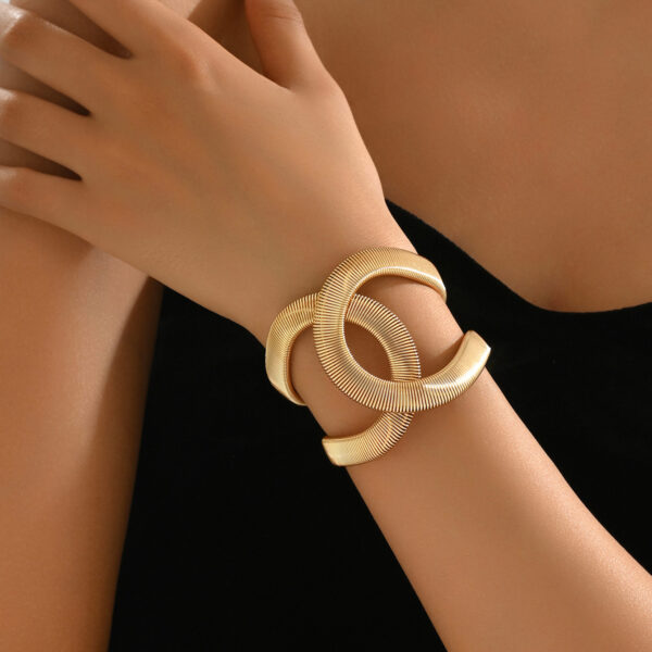 statement_gold-tone_interlocking_cuff_bracelet_image_1